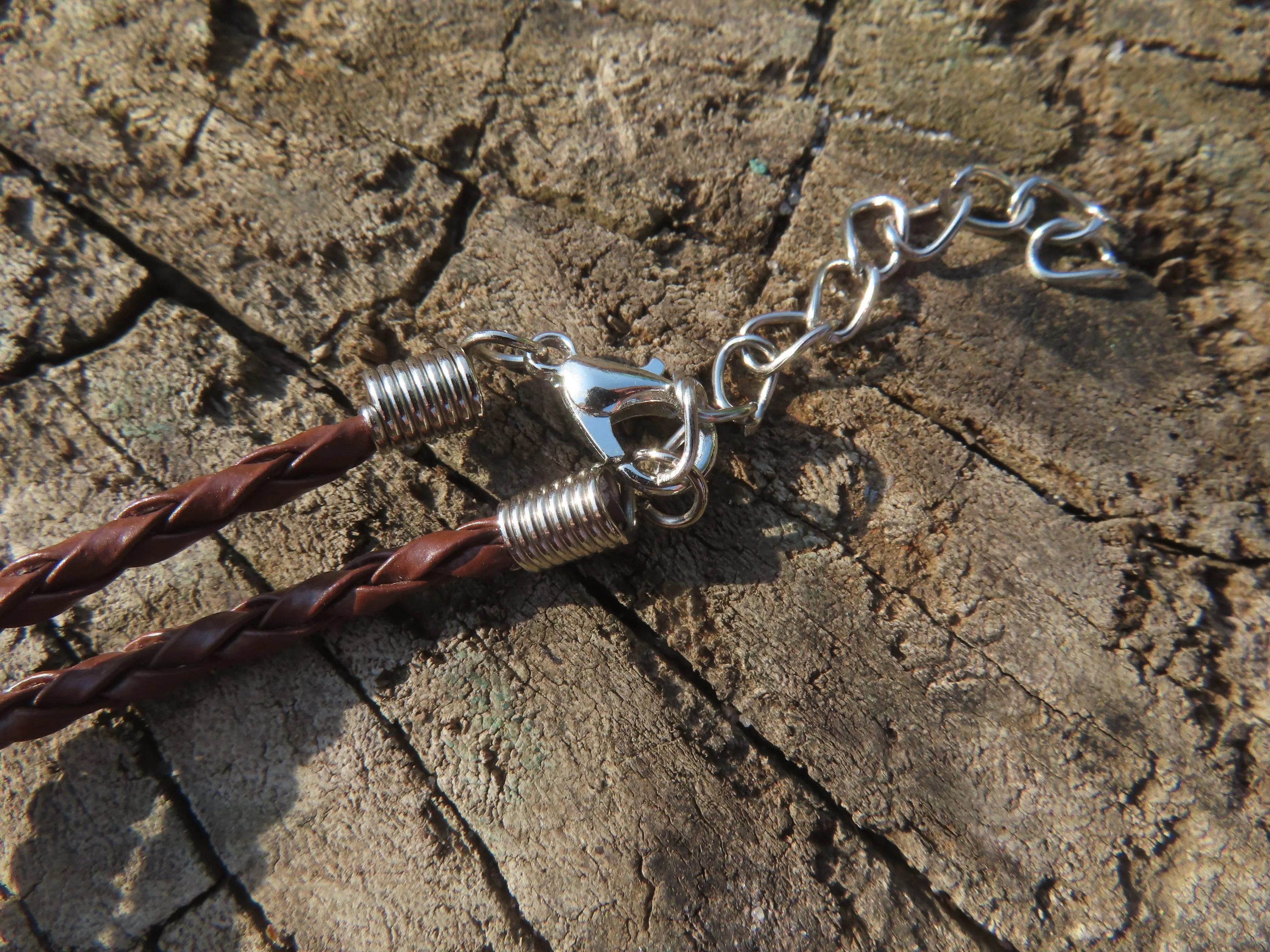 Polished Leopard stone "Great Zimbabwe Bird" Pendant with Copper Wire Wrap and Thong - sold per piece - From Zimbabwe